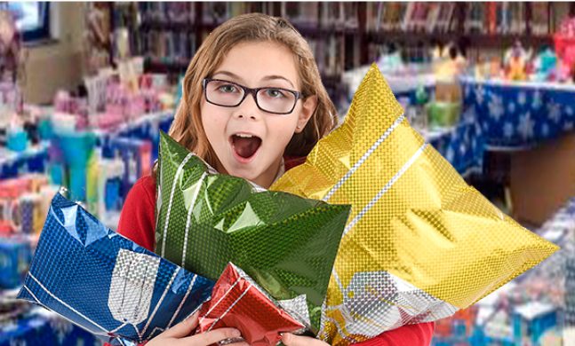 Excited young girl with gifts